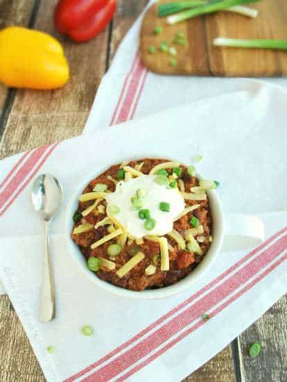 Authentic beef chili recipe with adjustable spices to suit your tastes. Great with cheddar, sour cream, and homemade cornbread! | Back To The Book Nutrition