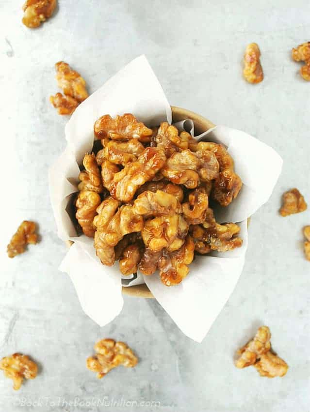 Naturally sweetened candied walnuts made with just 4 ingredients and ready in only 10 minutes! | Back To The Book Nutrition