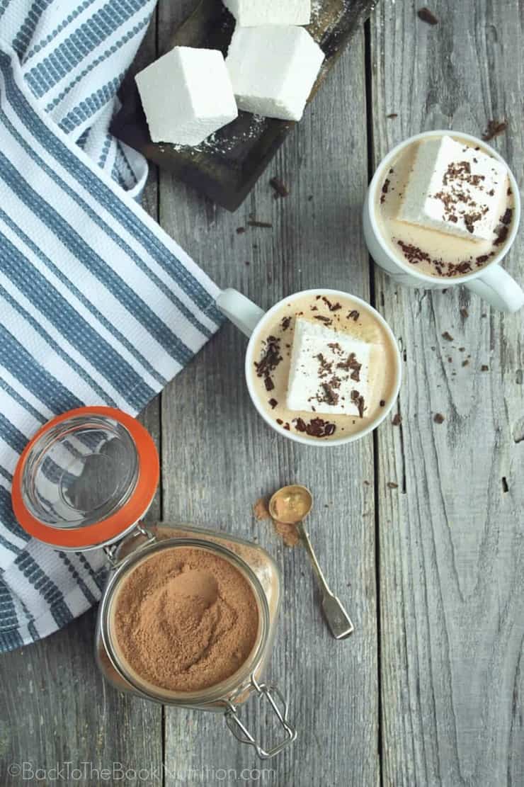 Cozy up with a mug of Healthy Homemade Hot Chocolate - mix is dairy free, naturally sweetened, and comes together in just a few minutes! | Back To The Book Nutrition