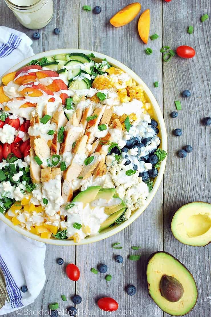 Summer Superfood Salad with Blue Cheese and Chicken - kale, corn, avocado and peaches + the best homemade blue cheese dressing ever! | Back To The Book Nutrition