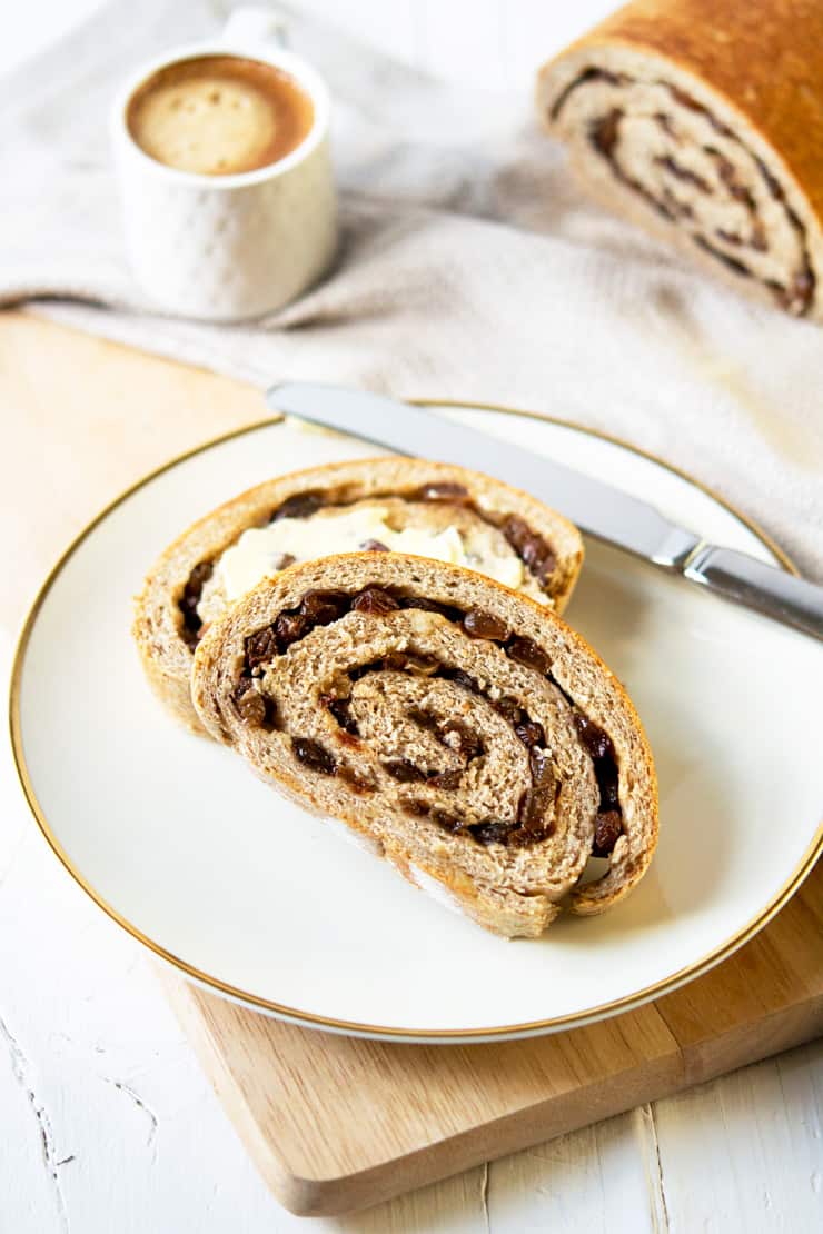 Two slices of cinnamon raisin bread on a plate