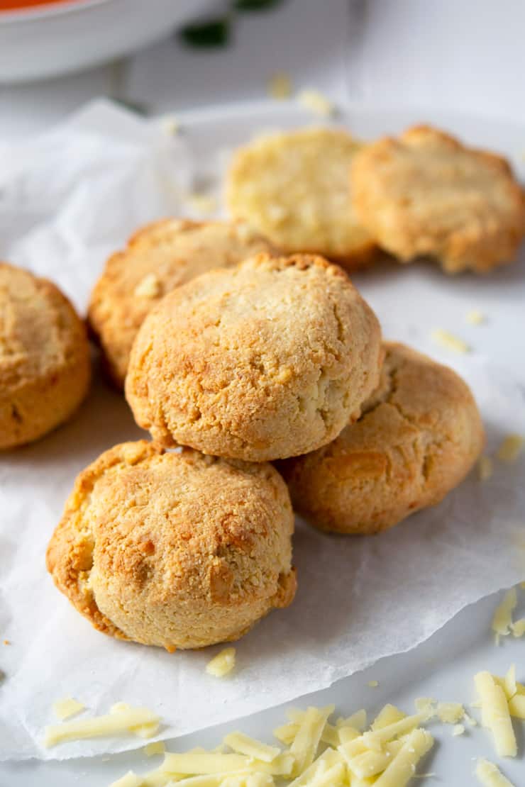 A close up of almond flour cheddar biscuits on a plate