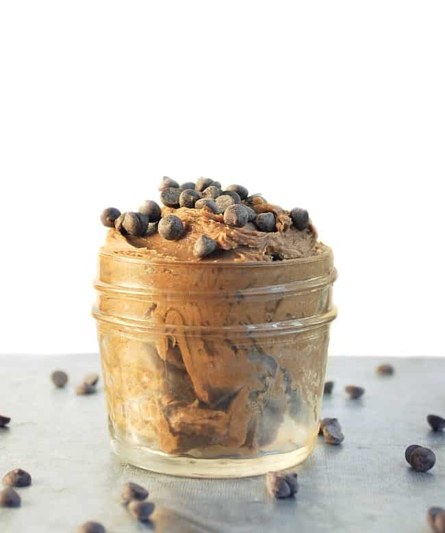 front view of DIY double chocolate body butter in small glass with mini chocolate chips sprinkled on top