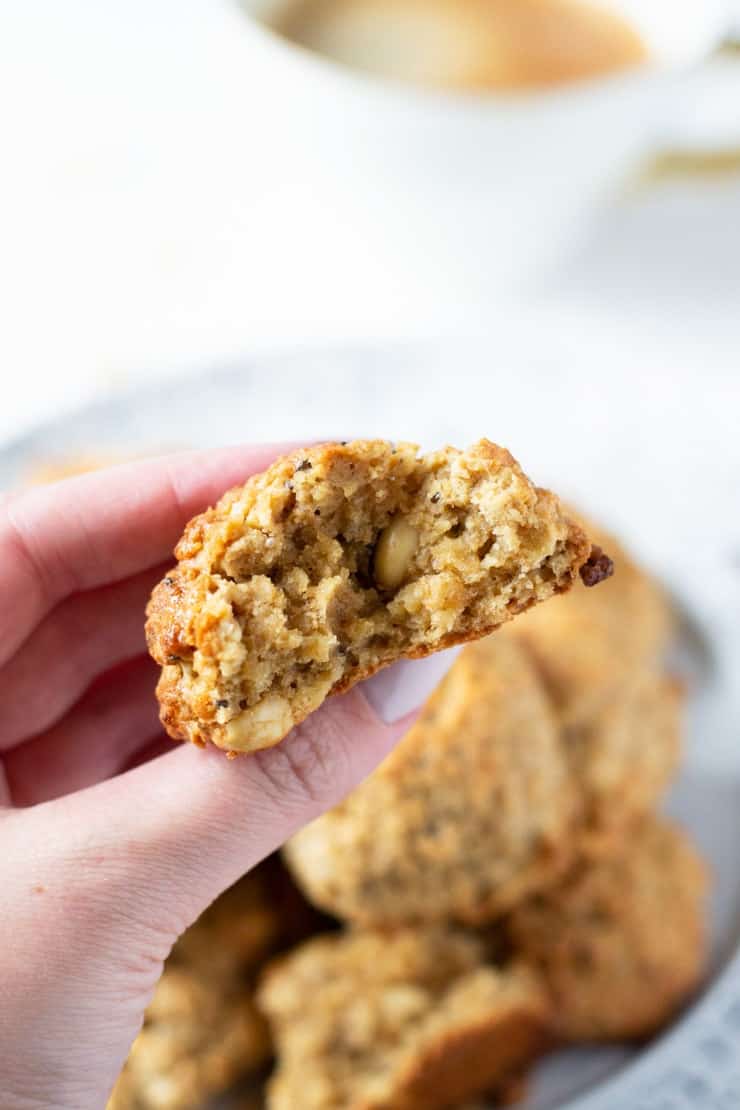 A hand holding a peanut butter oatmeal breakfast cookies