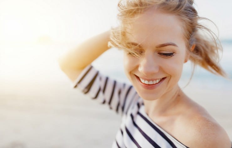 happy young woman on beach