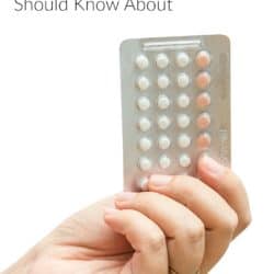 pack of birth control pills in woman's hand