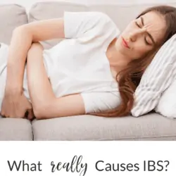 Collage - image of brunette woman lying on couch holding her stomach in pain with title text overlay: What really causes IBS + how to fix it for good!